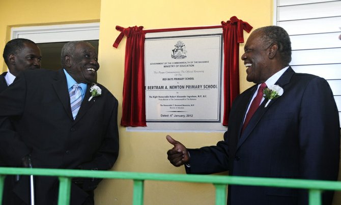 PRIME MINISTER Hubert Ingraham with Bertram A Newton at the unveiling of the plaque.