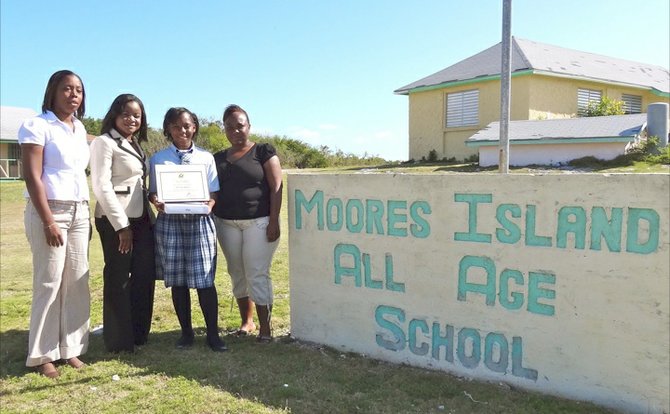 Moore’s Island All Age School’s English teacher, Principal, Dinnea Cooper, contest winner Devin Major and her proud mother, Monalisa Major.