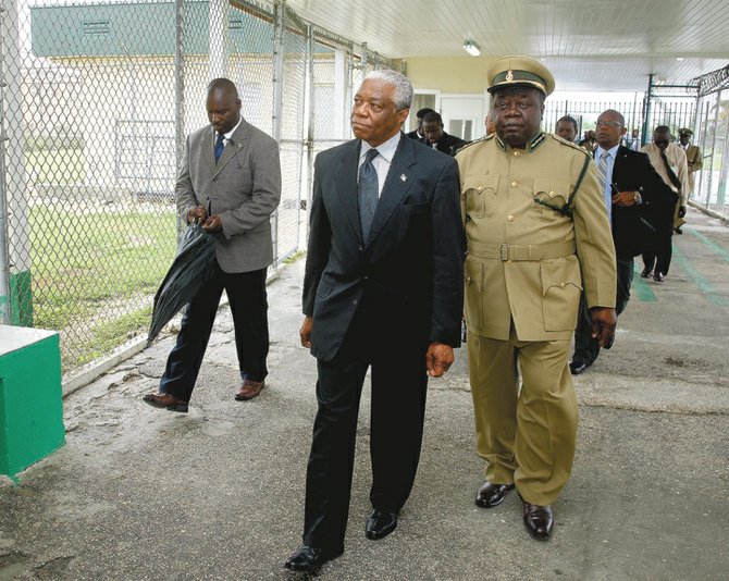 Dr Bernard Nottage tours the prison yesterday.