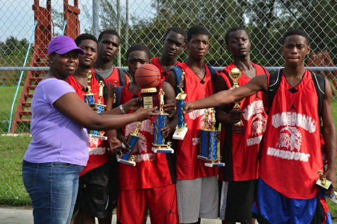 Jimico Brown, third from right, with his team-mates from Macedonia Baptist Warriors' 19-and-under team that was pennant winners and runners-up in the Baptist Sport Council's 2012 Basketball League.