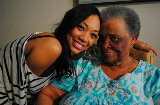Alexandria Christie posing with her grandmother, the late Trixie W Hanna.