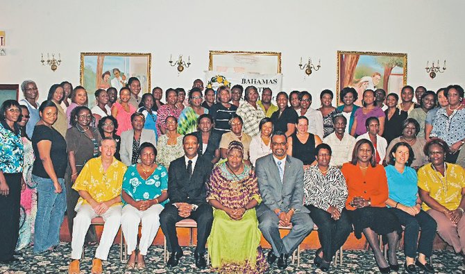 The Minister of Education, Jerome Fitzgerald, Bahamas Hotel Association president, Stuart Bowe, and pioneer Bahamian hotelier Nettica Symonette, pose with educators and tourism industry stakeholders who participated in the recent ninth Annual Summer Educators Internship Program.

