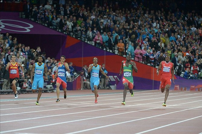 Kirani James (GRN), center, wins the 400m in a national record 43.94 during the London 2012 Olympic Games at Olympic Stadium. From left: Kevin Borlee (BEL), Demetrius Pinder (BAH), Luquelin Santos (DOM), Chris Brown (BAH), James and Lalonde Gordon (TRI). Kirby Lee-USA TODAY Sports