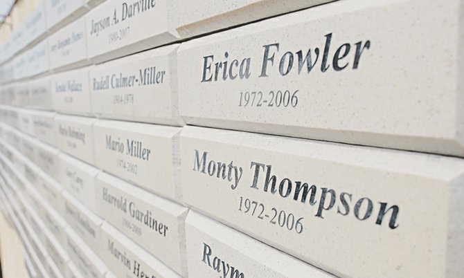 The Memorial Wall at New Covenant Baptist Church, commemorating murder victims, including the name of murder victim Erica Fowler, an employee of The Tribune at the time of her death.