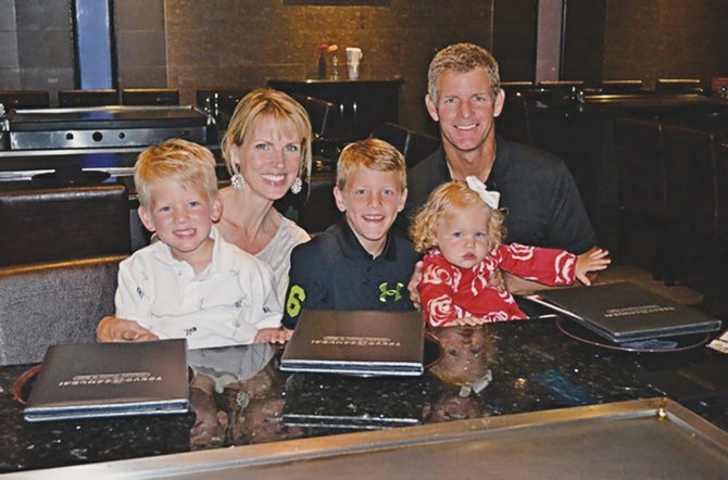 Mark Knowles with his wife Dawn and children Graham, Brody and Presley.