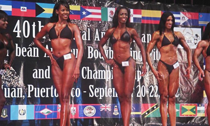 DAWNITA FRY (middle), placed 5th in the body fitness tall class.

