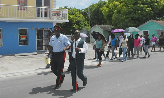 College staff and students joined by police for the Urban Renewal walkabout.