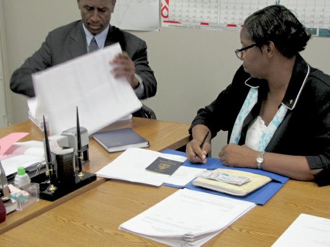 Ali McIntosh signs up for the North Abaco by-election.