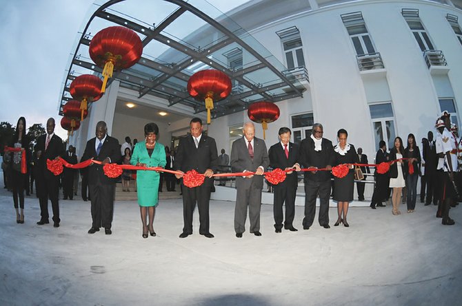 Governor General Sir Arthur Foulkes, Prime Minister Perry Christie, Ambassador Hu Shan and other officials cut the ribbon to officially open the new Chancery of the Embassy of the People’s Republic of China. Photos: Peter Ramsay/BIS

