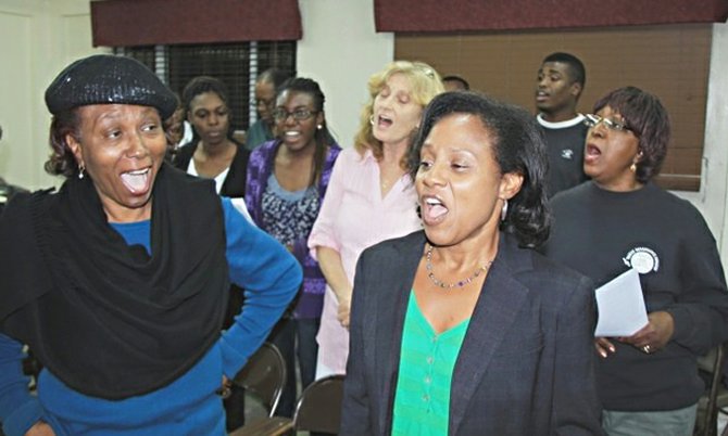 Some of the choir’s sopranos rehearsing for the upcoming Christmas concerts.