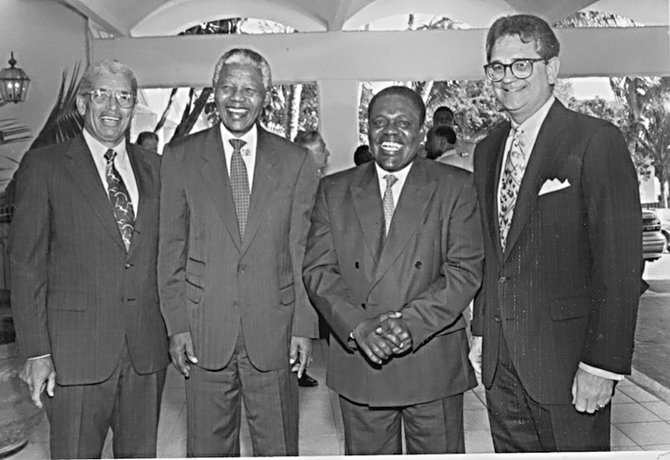 IN this picture published on January 5, 1994, African National Congress President Nelson Mandela visited Resorts International’s Paradise Island and lunched with Prime Minister Hubert Ingraham and other cabinet ministers. The group were hosted in a private suite by senior vice presidents Michael J Williams and J Barrie Farrington. After lunch, Mr Mandela chatted informally with Mr Williams and Mr Farrington about Sun International’s plans for the Paradise Island properties. The rest of the afternoon was spent touring Paradise Island Resort and visiting with the management of the Paradise Island Airpot, Gold Club, Ocean Club and Paradise, Paradise. From left: Mr Farrington, Mr Mandela, Prime Minister Ingraham and Mr Williams.

