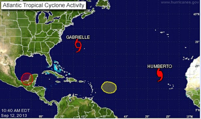 Graphic from the National Hurricane Center shows the weather systems.