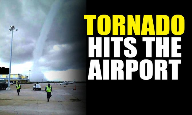 A reader sent us this photo of a tornado at the airport this afternoon. 