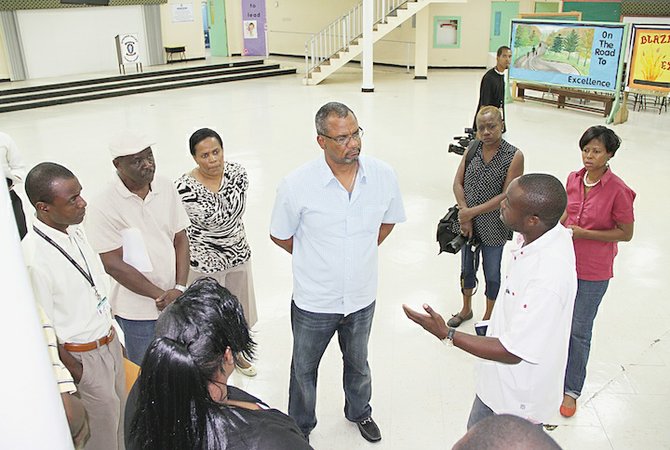Minister of Education Jerome Fitzgerald and education officials met members of the PTA board at Stephen Dillet Primary School yesterday to answer questions and to tour the school. Photo: Tim Clarke
