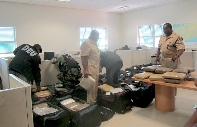 ACP Emrick Seymour is seen at Police Headquarters following the seizure of some $2.3 million worth of marijuana early Wednesday morning on Grand Bahama. Some 21 duffle bags were discovered in a van that was travelling on the Warren Levarity Highway. Four male occupants were taken into custody. Two persons were also later arrested and taken into custody in connection with the matter. Police investigations are continuing.  