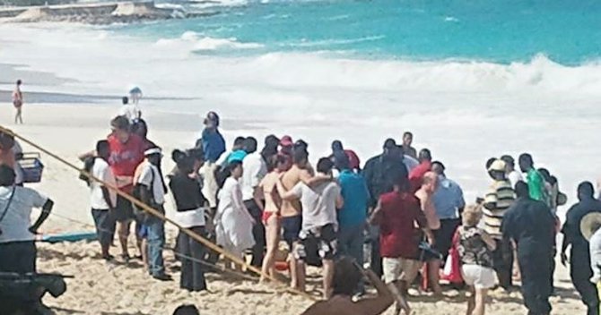 A photo posted to Facebook by Rodney Moncur showing the scene as crowds gathered round following the drowning. 
