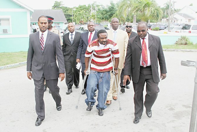 Jason Tino Ferguson is led to court.