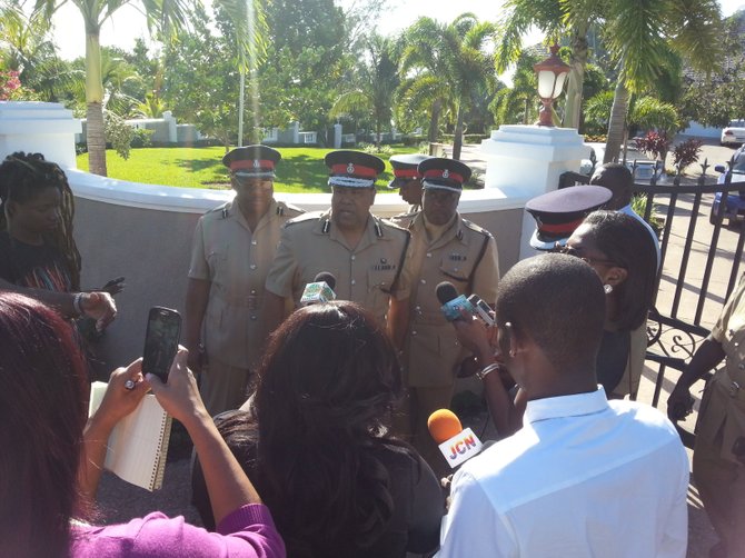 Commissioner of Police Ellison Greenslade talks to reporters outside of Deputy Prime Minister Philip 'Brave' Davis' home.