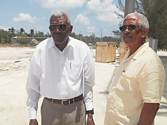 Thomas A. Robinson and Winston 'Gus' Cooper on construction site for the new TAR Stadium.