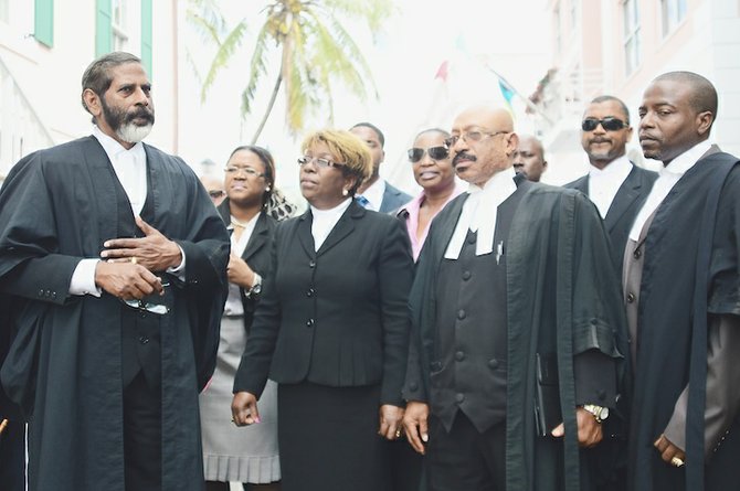 MURRIO Ducille, front row, second from right, and fellow lawyers outside court yesterday.
