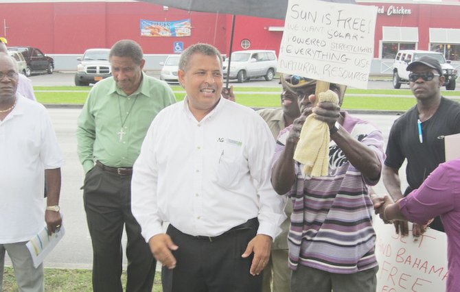 MEMBERS of the protest group at the last demonstration held against the cost of power in Grand Bahama. 