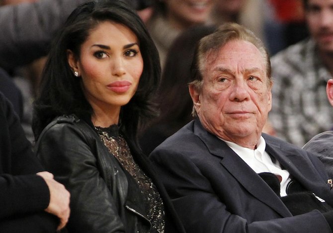 In this December, 2010 photo, Los Angeles Clippers owner Donald Sterling and V. Stiviano watch the Clippers play the Los Angeles Lakers during an NBA preseason basketball game in Los Angeles. (AP)