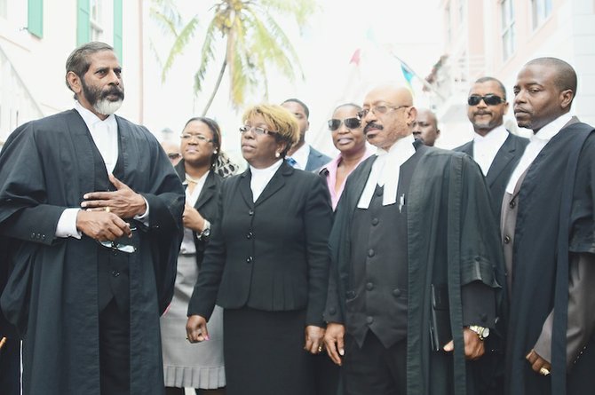 MURRIO Ducille, front row, second from right, and fellow lawyers outside court yesterday.