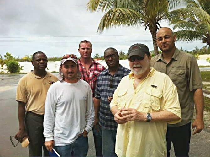 Part of the area at Carleton Creek cleared by the Treasure Sands Club. Pictured during a visit last week are (from left): Mr Flowers, administrator in the Office of the Prime Minister at Marsh Harbour; Matt Claridge of Abaco Defenders; Tim Blakely of Treasure Sands Club; Dr Keith Tinker, executive director of the Antiquities Corporation; Larry Smith; and Dr Michael Pateman, senior archaeologist at the Antiquities Corporation.
