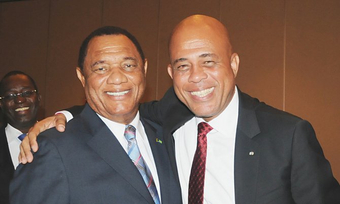Prime Minister Perry Christie pictured with Haitian president Michel Martelly yesterday. Photo: Peter Ramsay/BIS 