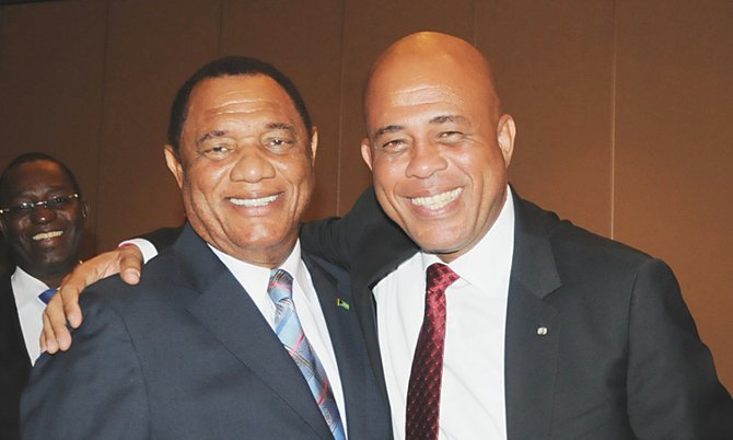 Prime Minister Perry Christie pictured with Haitian president Michel Martelly yesterday. Photo: Peter Ramsay/BIS
