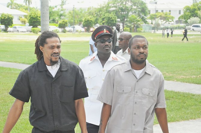Accused Coderold Wallace aka Coderold Miller, left, and Dudley Seide Jr are in trial in the Supreme Court for the murder of Grand Bahama businessman Leslie Maycock on July 15, 2009. The trial opened yesterday. Photo: Vandyke Hepburn 
