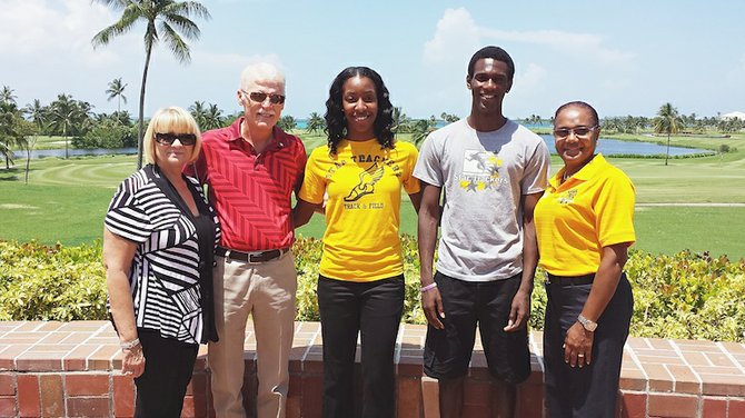 Mr and Mrs JR McDonald is pictured at left, next to athletes Taryn Rolle and Kelson Pierre. At right is Laura Charlton.