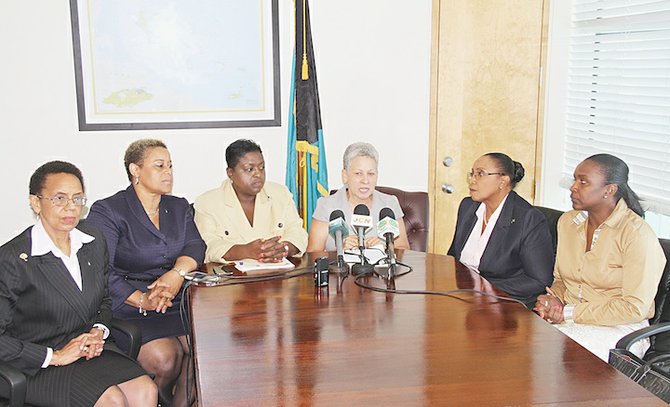 
Attorney General Allison Maynard-Gibson, Minister of State in the Ministry of Transport and Aviation Hope Strachan, Minister of Social Services Melanie Griffin, Minister of Transport and Aviation Glenys Hanna-Martin and Senator Cheryl Bazard yesterday. 
Photo: Tim Clarke/Tribune Staff
