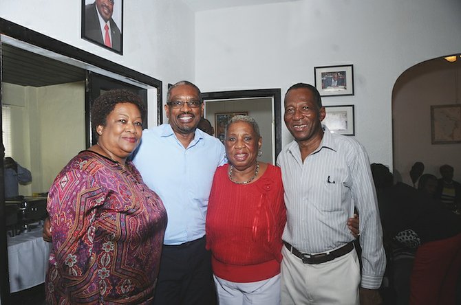 FNM leader Dr Hubert Minnis with guests at his open house event yesterday.