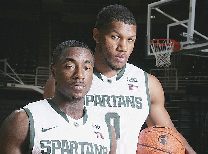 Freshmen Lourawls Nairn Jr (left) and Marvin Clark Jr pose during the team’s NCAA college basketball media day Tuesday in East Lansing, Michigan.    (AP Photo/Al Goldis)
