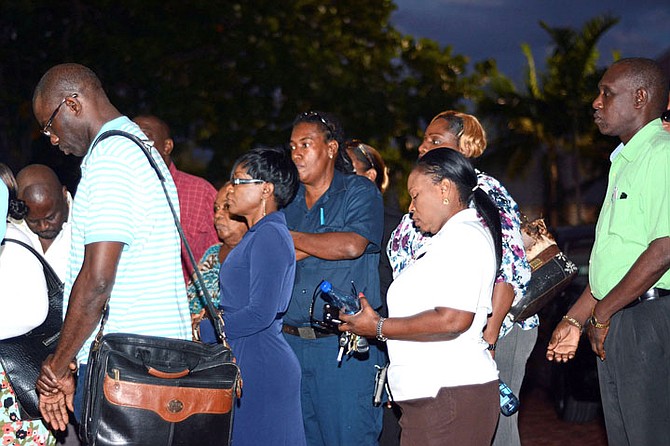 Terminated workers from the Crystal Palace hotel wait outside the Office of the Prime Minister on Cable Beach last night.