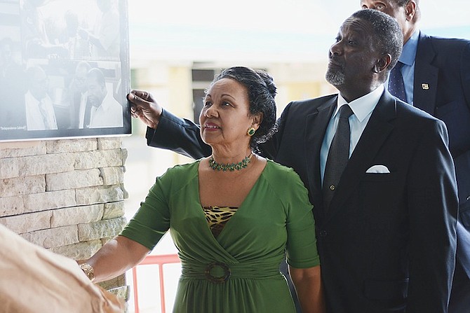 Lady Ingrid Darling unveiling the exhibition paying tribute to her husband, Sir Clifford Darling.
