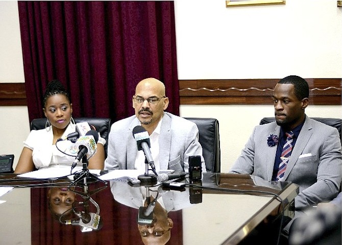 DR MYLES MUNROE’S daughter Charisa and son Chairo (right) with Bahamas Faith Ministries Senior Pastor and Board of Governors chairman Dave Burrows yesterday.
Photo: Shawn Hanna/Tribune staff