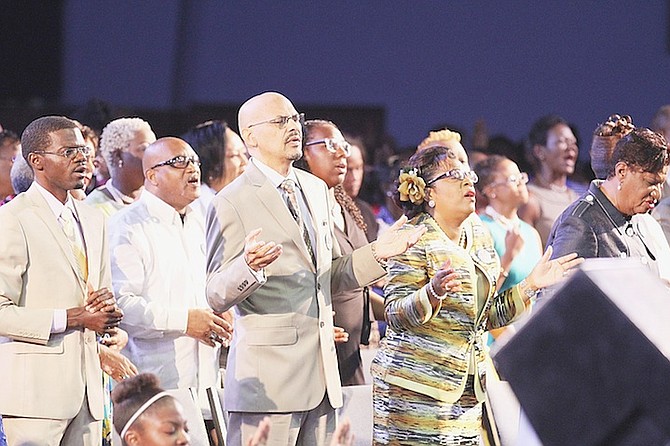 Pastor Dave Burrows, pictured yesterday, centre, has been confirmed as the new senior pastor at Bahamas Faith Ministries International. Photo: Tim Clarke/Tribune Staff
