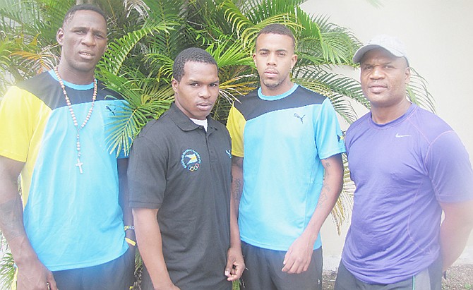 MEDAL HOPES: Shown (l-r) are CAC boxing team members Carl Hield, Godfrey Strachan, Rashield Williams and coach Andre Seymour.