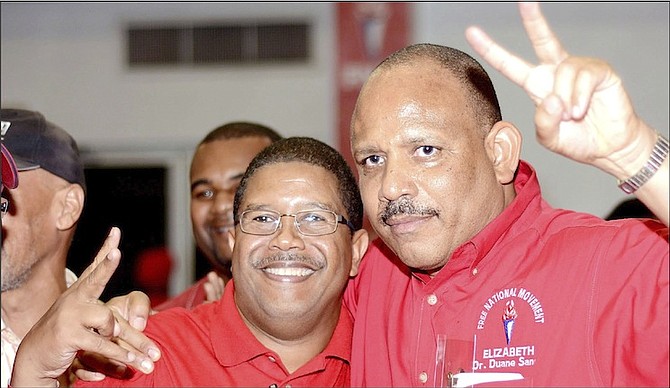 NEWLY elected Free National Movement Deputy Leader K Peter Turnquest (left) with defeated candidate Dr Duane Sands.
Photo: Shawn Hanna/Tribune staff