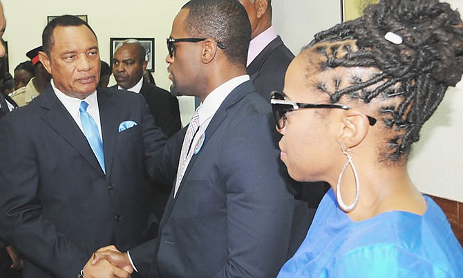 Prime Minister Perry Christie expresses his sympathies to Myles Chairo Munroe and Charissa Munroe, the children of Dr Myles and Ruth Munroe. Photo: Peter Ramsay/BIS