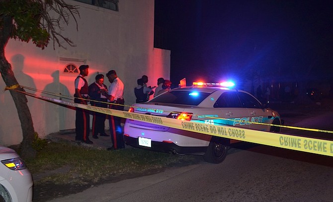 Police at the scene of the shooting. Photo/Bahamianview.com