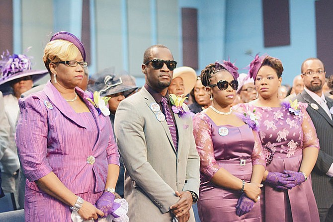 The family of Dr Myles and Ruth Munroe at yesterday’s funeral service, including son and daughter Chairo and Charissa, centre. Photo: Shawn Hanna/Tribune Staff
