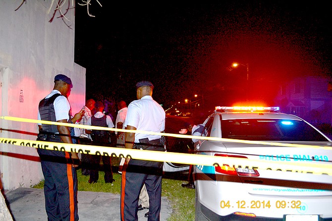 Police at the scene of the officer's death on Thursday. Photo/bahamianview.com