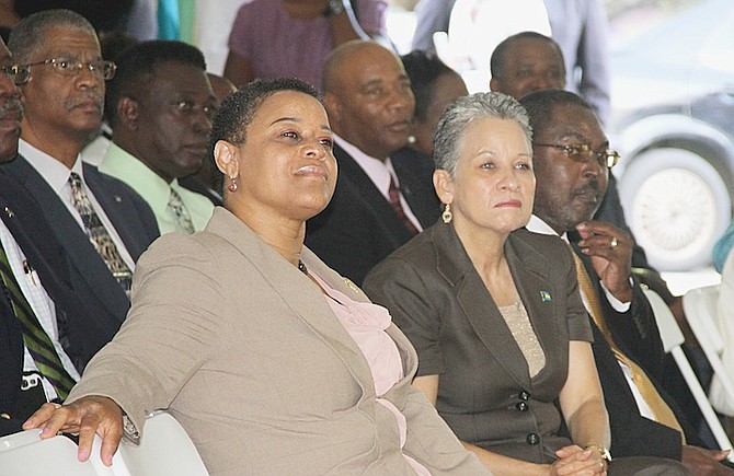 Transport and Aviation Minister Glenys Hanna-Martin with Minister of State Hope Strachan, left.
