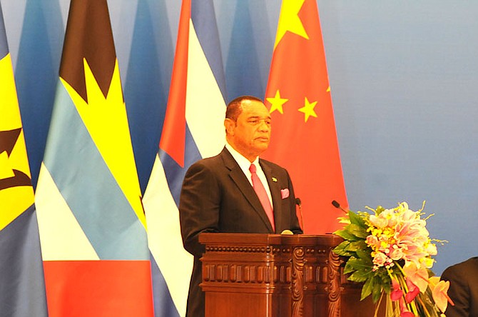 Prime Minister Perry Christie speaking in China.