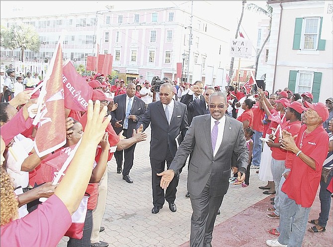 Leader of the FNM Hubert Minnis and members of the FNM party arrive in Rawson Square after their protest over the Bank of the Bahamas, in which they called for the management team at the bank to be fired. 