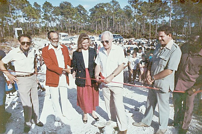 Sir Jack Hayward along with with Peter Barratt, Sonny Waugh, Lynn Holeswesko and others at the opening of Operation Raleigh Bridge at Lucayan National Park.