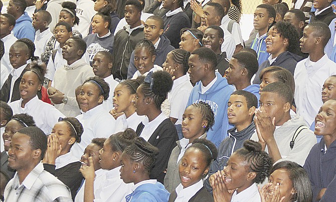 Youngsters at Anatol Rodgers High School yesterday, where 20 computers were donated by Island Luck.